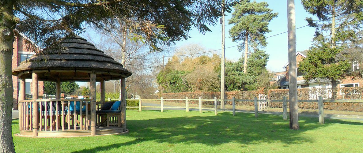 3 metre gazebo in open garden next to a road